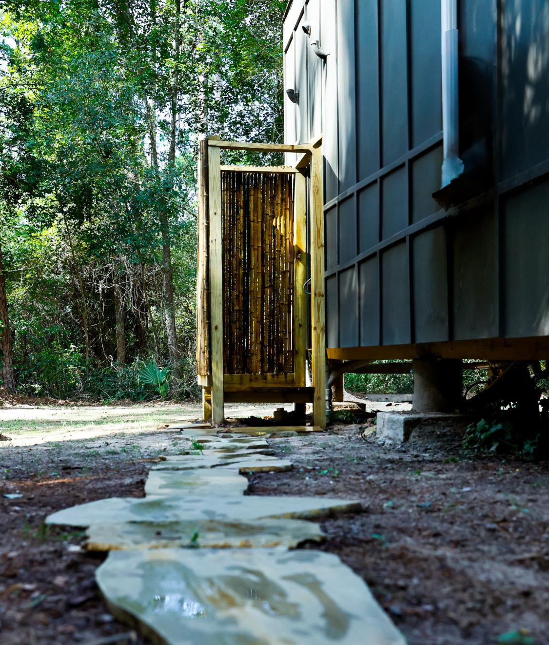 Outdoor shower and cabin walkway