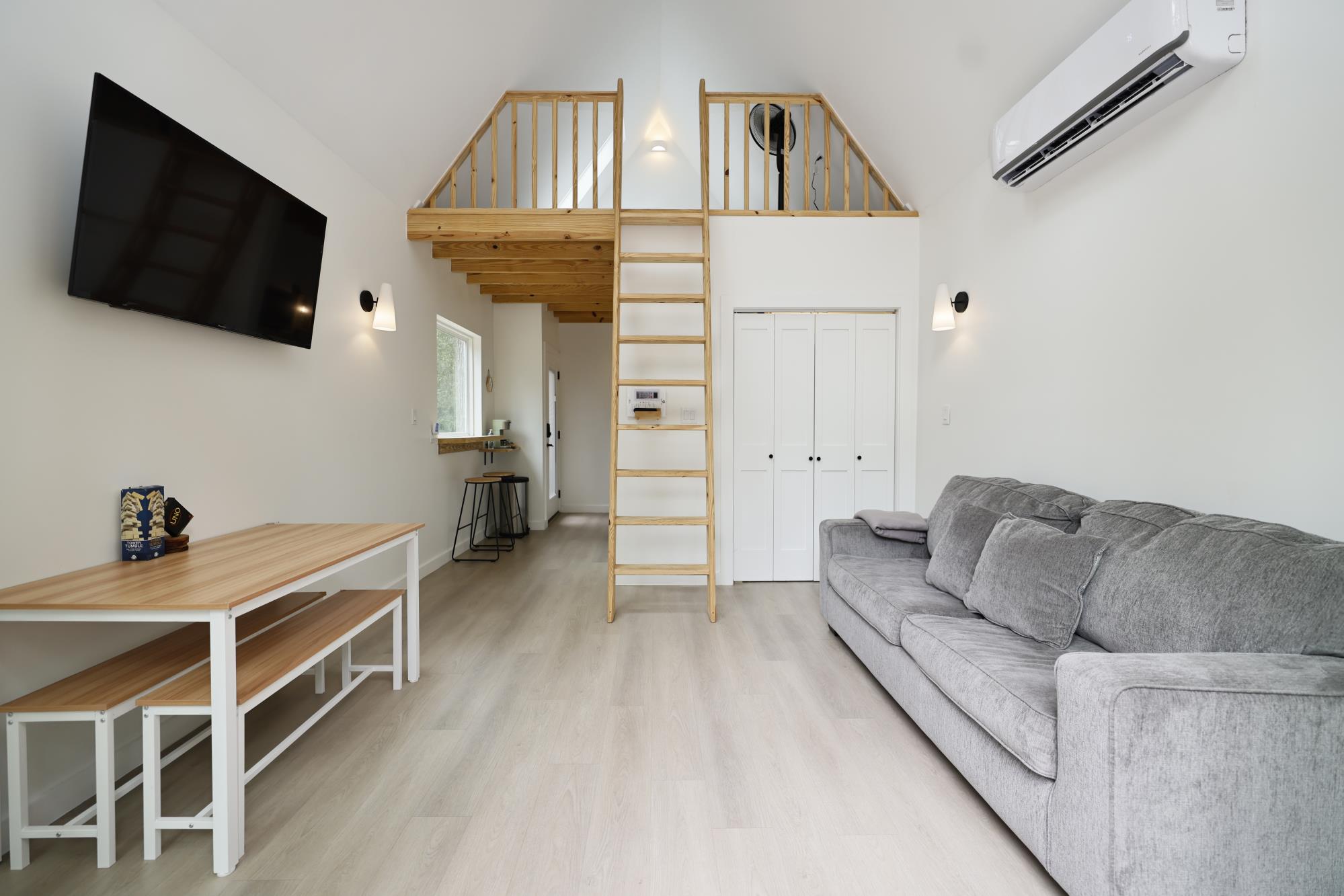 Cabin living room with loft and vaulted ceiling
