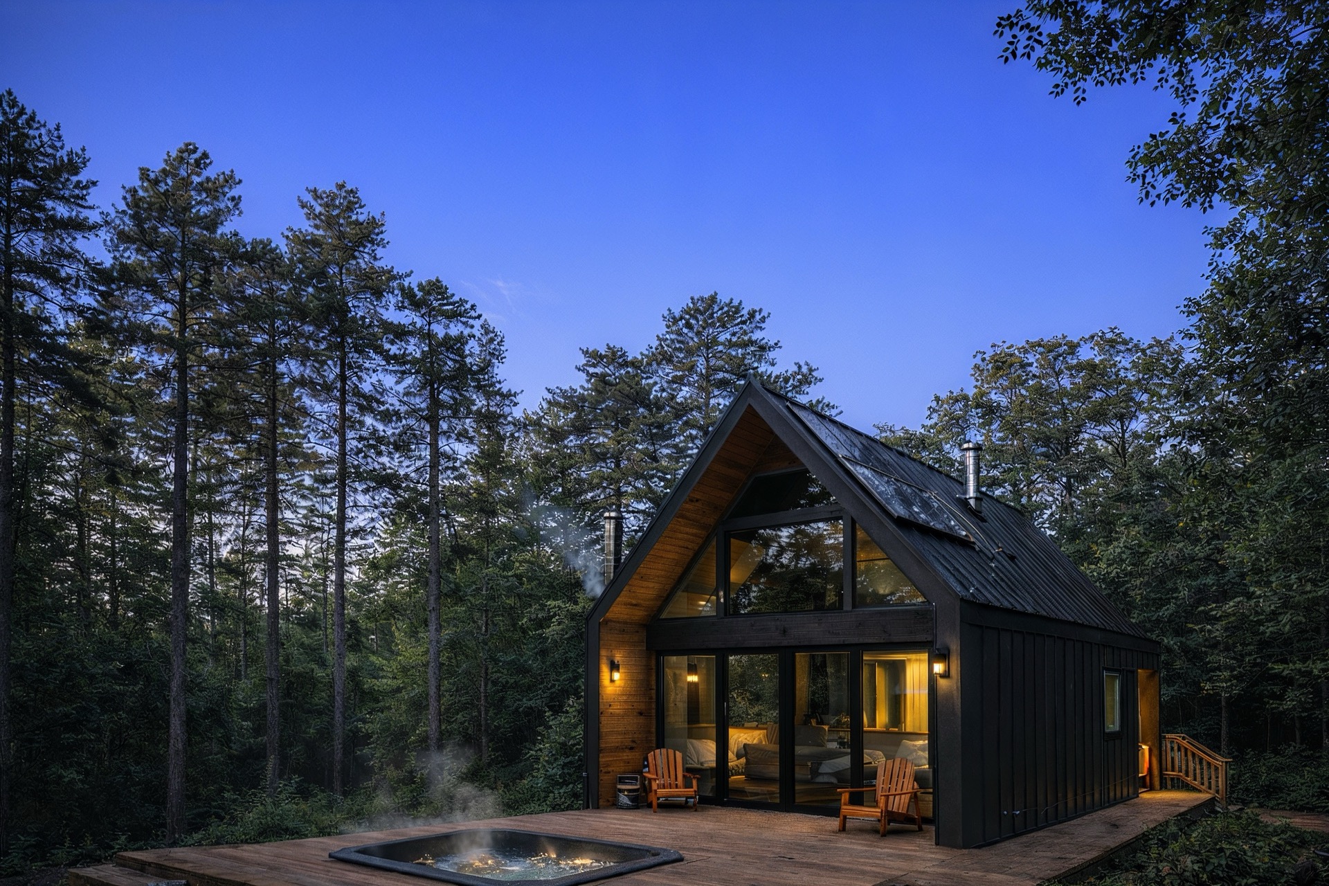 Post-renovation cabin at twilight with plunge pool